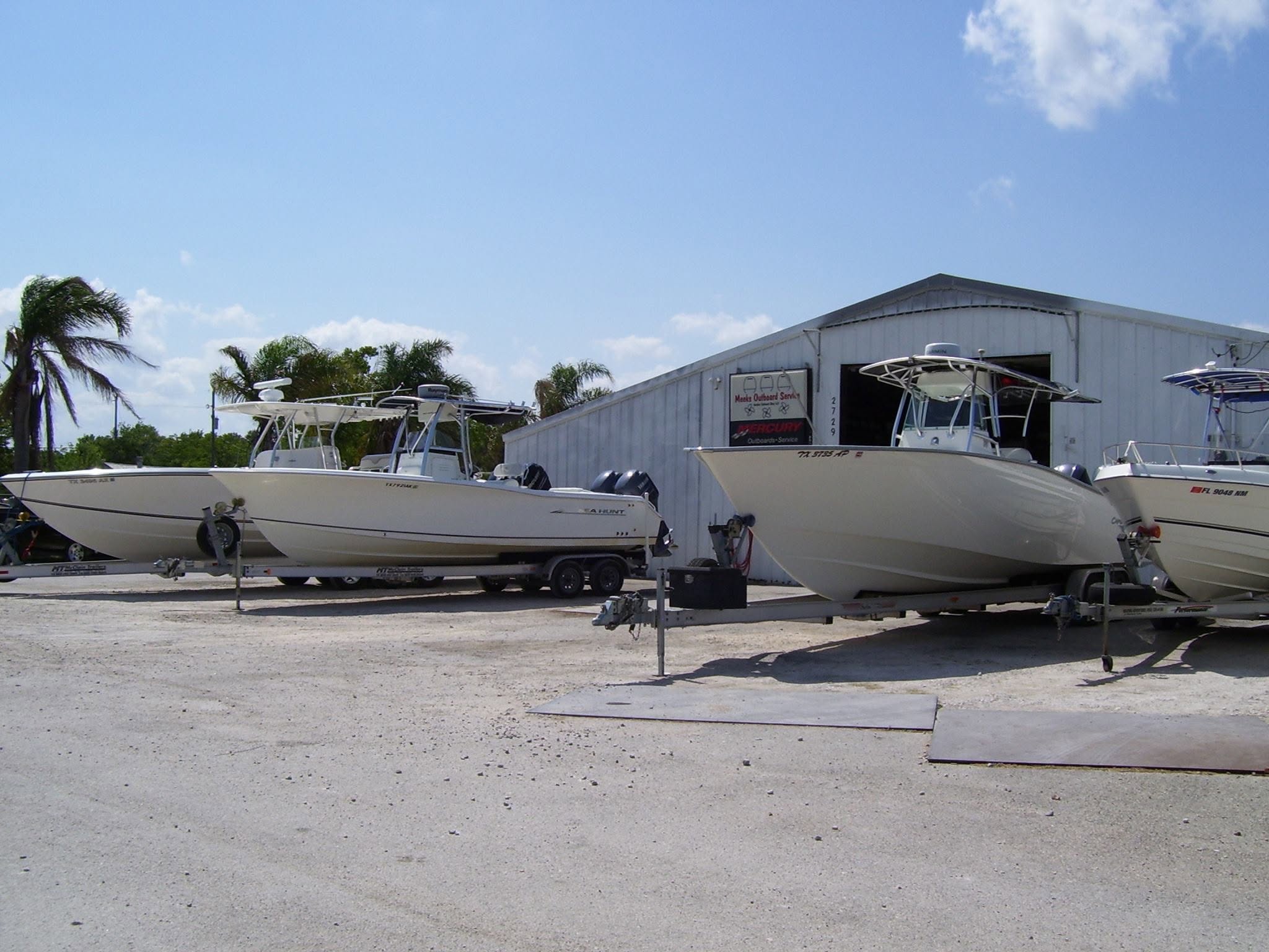 Boats outside Meeks Outboard Service in Kemah, Texas